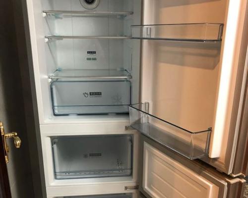 冰箱上面开着门不制冷的原因和解决方法（探究冰箱上面开着门不制冷的问题）